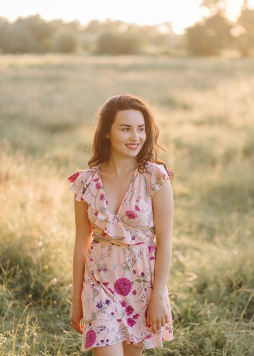 Young woman walking in forest